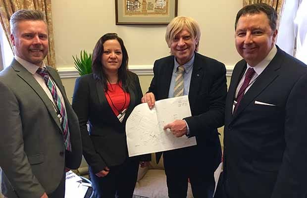Michael Fabricant being shown the plans for the lifts at Lichfield Trent Valley station