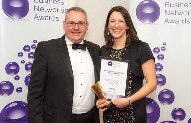 Award sponsor Peter Robinson hands over the prize to Nikki Raine