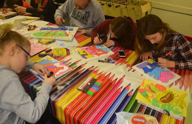 Fun Club members taking part in a graffiti workshop