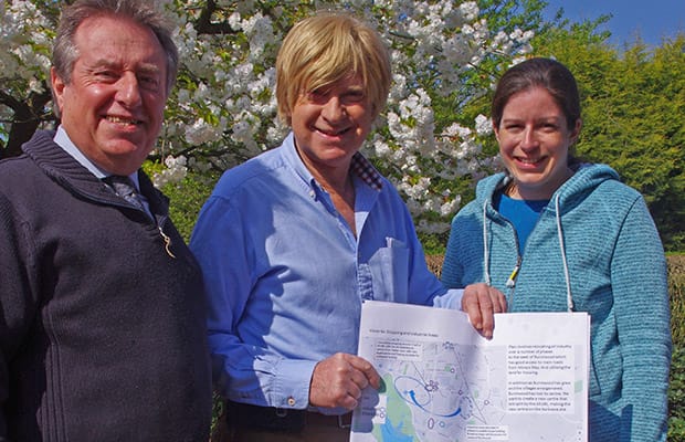 Peter Button and Lisa Farrington show Michael Fabricant MP one of their plans for a ‘Better Burntwood’