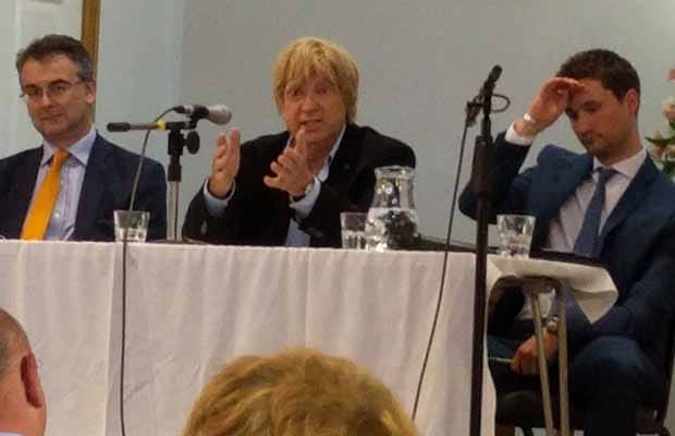 Michael Fabricant (centre) speaking at the hustings event in Lichfield alongside Paul Ray (left) and Robert Pass