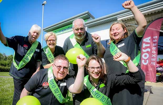 Staff celebrating the refurbishment of the store in Fradley