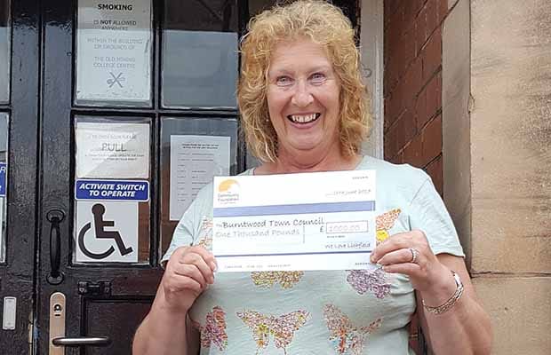 Cllr Heather Tranter with the cheque from the We Love Lichfield Fund
