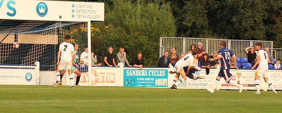 Muzzy Nduna scores with a diving header. Pic: Dave Birt