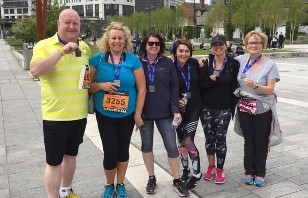 Logan Khan, Angela Hiney Bancroft, Sue Kinsey, Luisa Cockerill, Jennine Phillips and Anne-Marie Taylor show off their Birmingham 10k medals