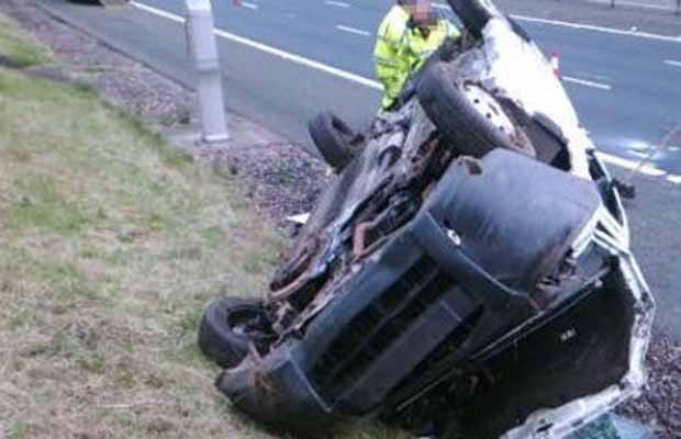The overturned van on the M6 Toll