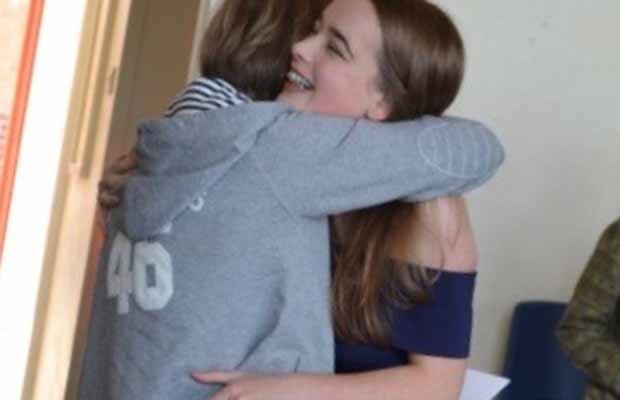 Elizabeth Crowe is congratulated on her exam results