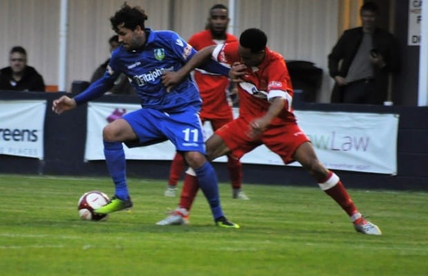Chris Baker battles for the ball. Pic: Pamela Mullins