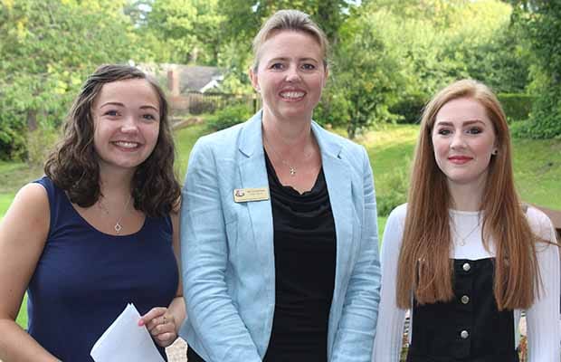 Students Lucy Windsor and Anisha Jordan with Lichfield Cathedral School headteacher Susan Hannam