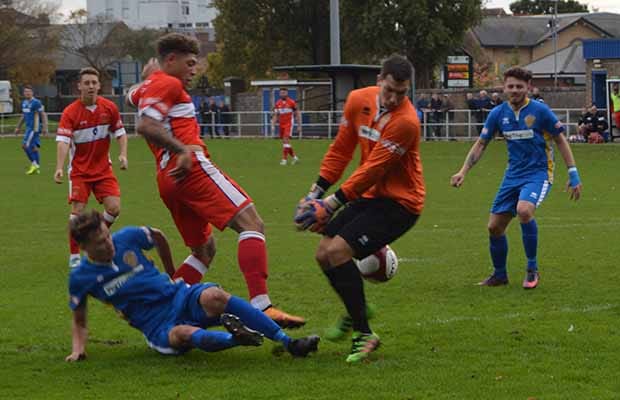 Ryan Wynter is denied by the Spalding United keeper. Pic: Louise Yates