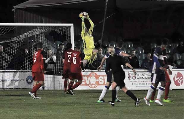 The Market Drayton Town keeper claims a cross. Pic: Pamela Mullins
