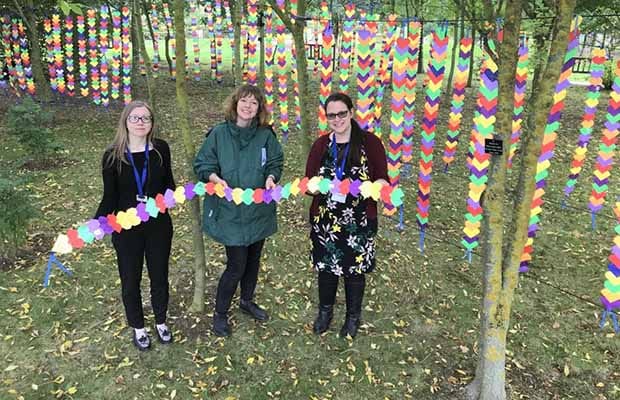 Artist Nicola Colclough with Liz Blood and Kathryn Rogerson from the National Memorial Arboretum