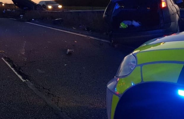Emergency services at the scene of the crash on the A38