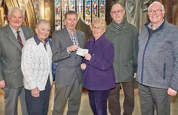Maureen Woodcock MBE, Chair of Friends of the Garrick, is joined by some of the committee members as she presents the cheque to Nick Sedgwick, Chair of St Mary’s Trustees