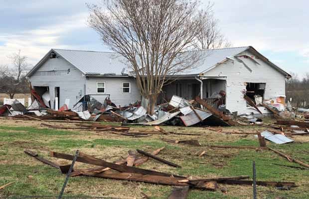 The damaged family home in Kentucky