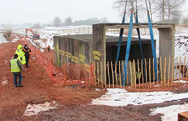 The last piece of the current tunnel being moved into place