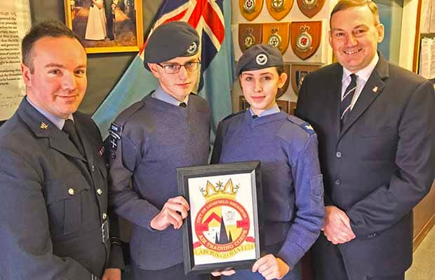 Flt Lt Chris Kelly, cadet Luke Lambert-Dean, cadet corporal Chloe Wright and squadron chairman Tony Davis