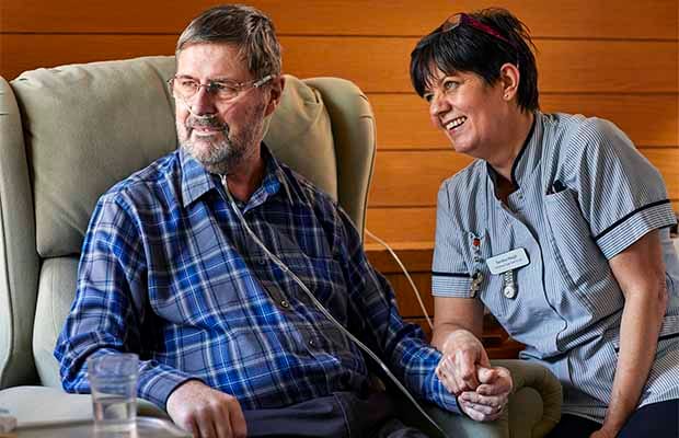 The photograph of Richard Bailey with nurse Sandra Haigh that featured on the cover of St Giles Hospice's strategy document