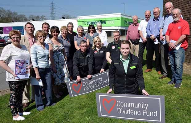 Members of some of the groups benefiting from the Community Dividend Fund money