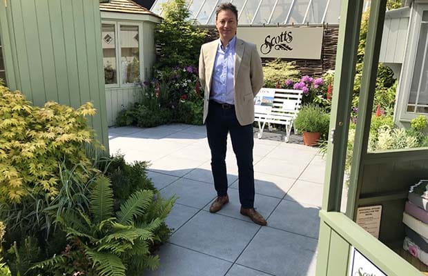 Ethan Mason managing director Mike Leeming with his porcelain company's paving on show at the Chelsea Flower Show