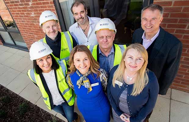 Sarah Sanderson, Ged Rodgers, Simon Price, Chris Backhouse, Carrie Jahn, Lisa Downes and Julian Fisher celebrate the donation to We Love Lichfield
