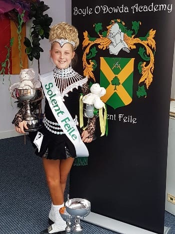 Heidi Hawkes with her trophies from the Solent Feis Irish dancing competition