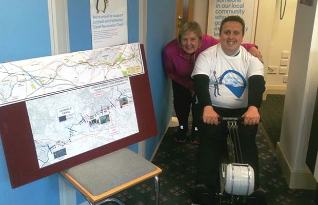 Stuart Noble and Julie Bolton on the rowing machine