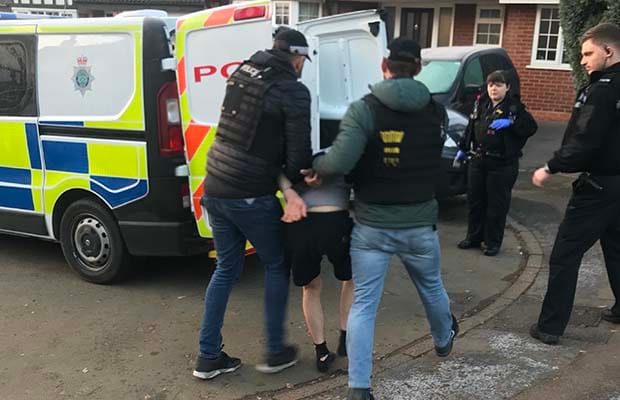 The man being arrested by police