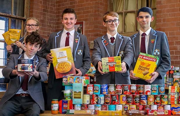 Pupils with some of the items collected for the Lichfield Foodbank