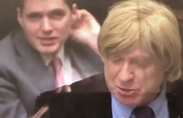 Huw Merriman caught on camera behind Michael Fabricant in the House of Commons