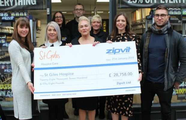 The donation is handed over to St Giles Hospice by Zipvit staff