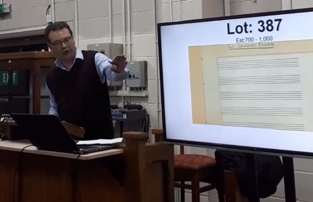 Auctioneer Richard Winterton selling the Elgar score
