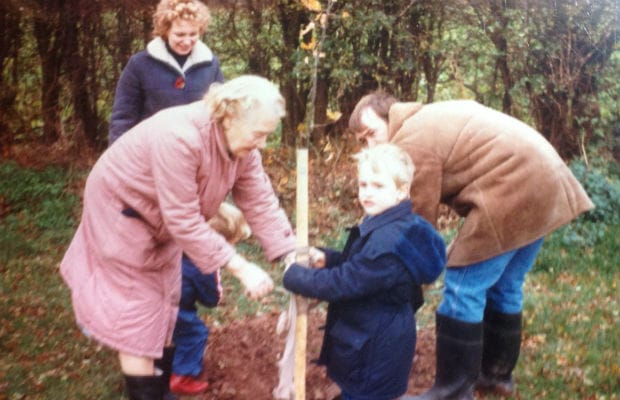 Bob Harrison and his family planting their tree in 1986