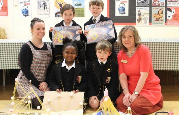 Lichfield Cathedral Junior School’s Julie Peters and Laura Rack with students Mei-Li Woo, Carter Chatting, Anne- Marie Kaguramamba and Sebastian Shinebaum