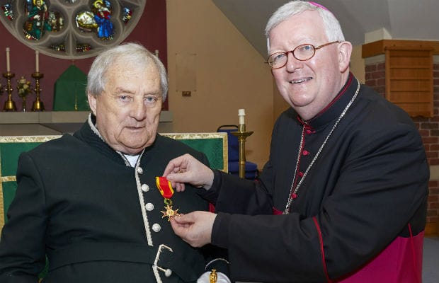 Noel Sweeney receiving the Order of St Gregory