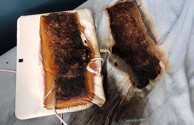 Some of the damage caused by the tablet left charging on a bed overnight