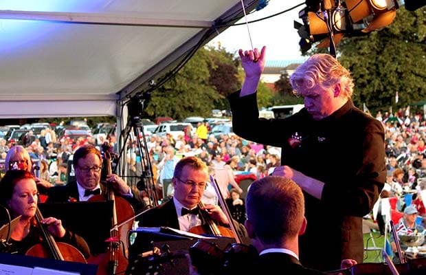 Dr Richard Jenkinson conducting the British Police Symphony Orchestra at the Lichfield Proms