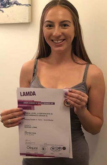 Sophie Lowe with her exam certificate