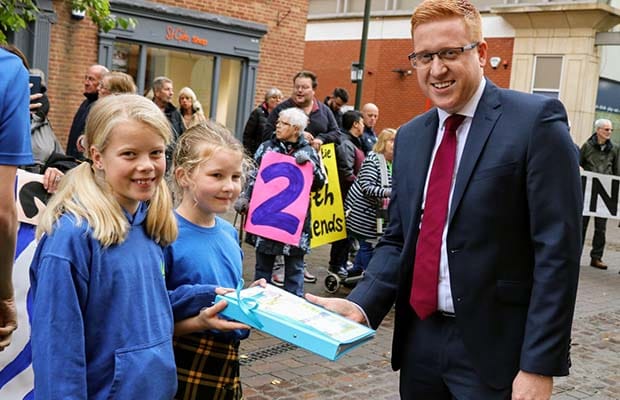 Cllr Doug Pullen receiving the petition outside the Garrick ahead of the Cabinet meeting