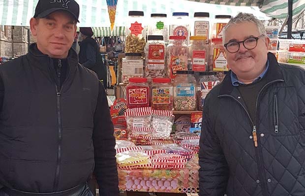 John Madden (right) meeting a market trader in Lichfield