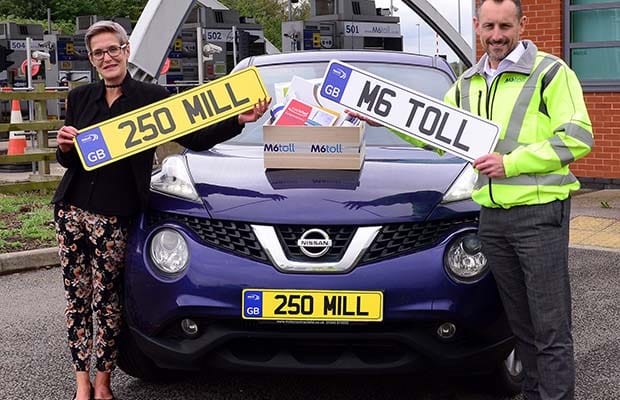 Rachael Davis celebrating with James Hodson, M6toll director
