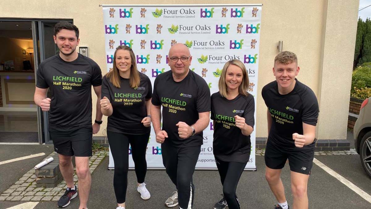 Nick Hepburn, Gemma Randle, Martin Ward, Charlotte Trueman and Nick Heath from Four Oaks Financial Services getting ready for the Lichfield Half Marathon