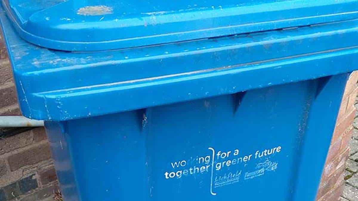 Blue recycling bin