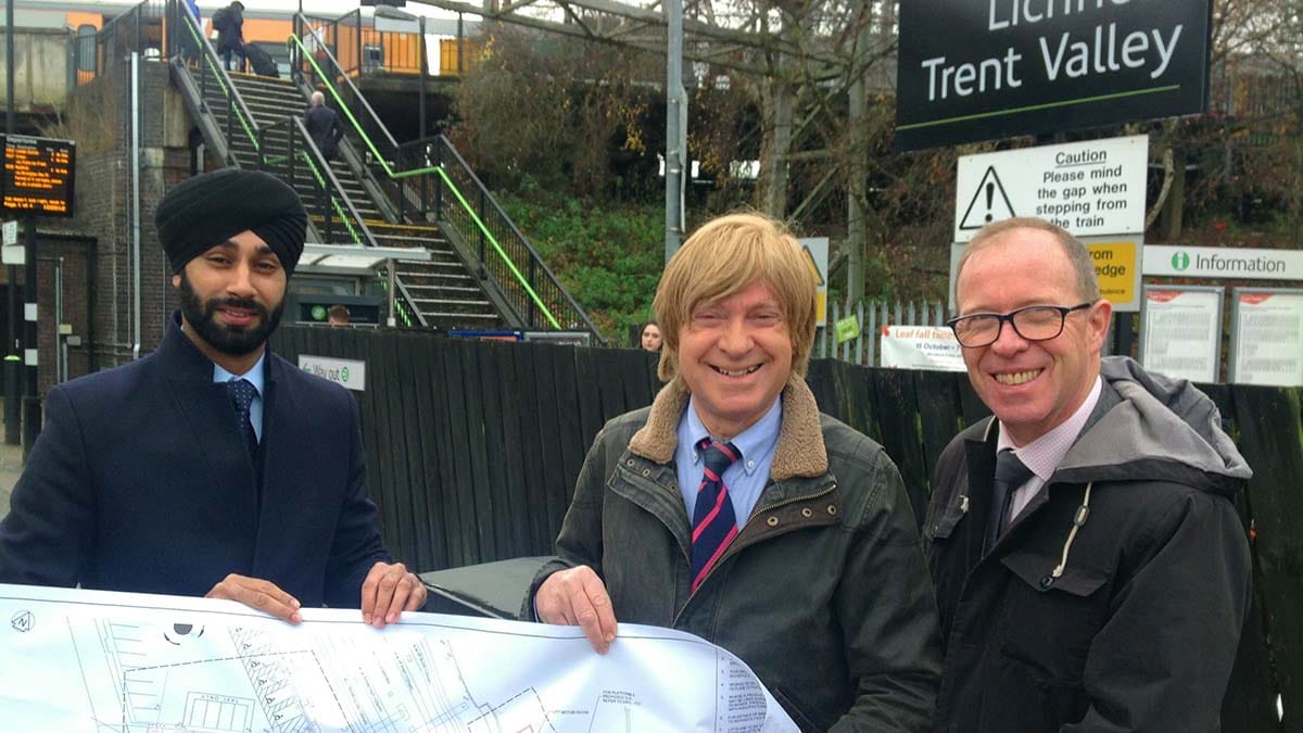 Michael Fabricant with Harpreet Singh-Moore and Richard Brooks of Network Rail with plans for the project back in 2018