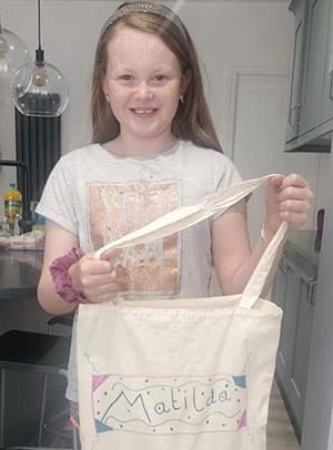Matilda with one of the bags supplied by The Fun Club Hub