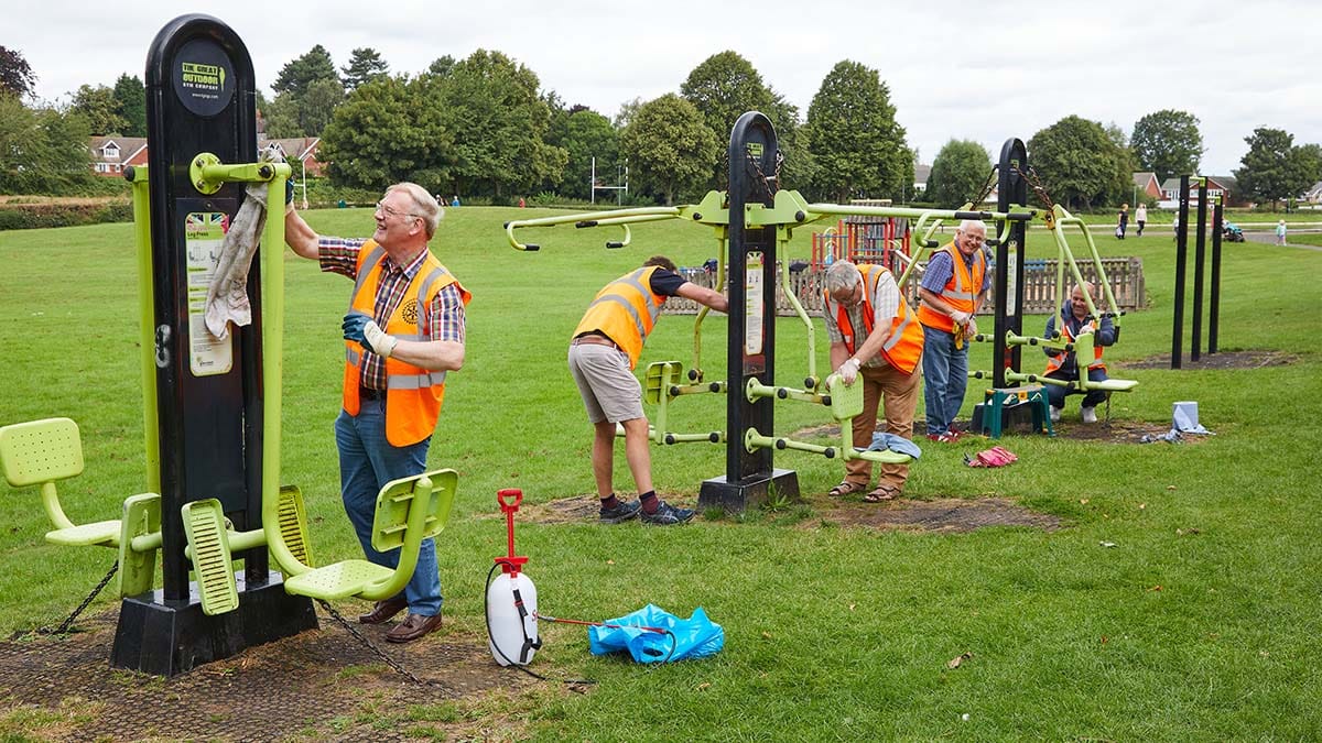 The Lichfield St Chad Rotary Club volunteers cleaning the outdoor gym equipment