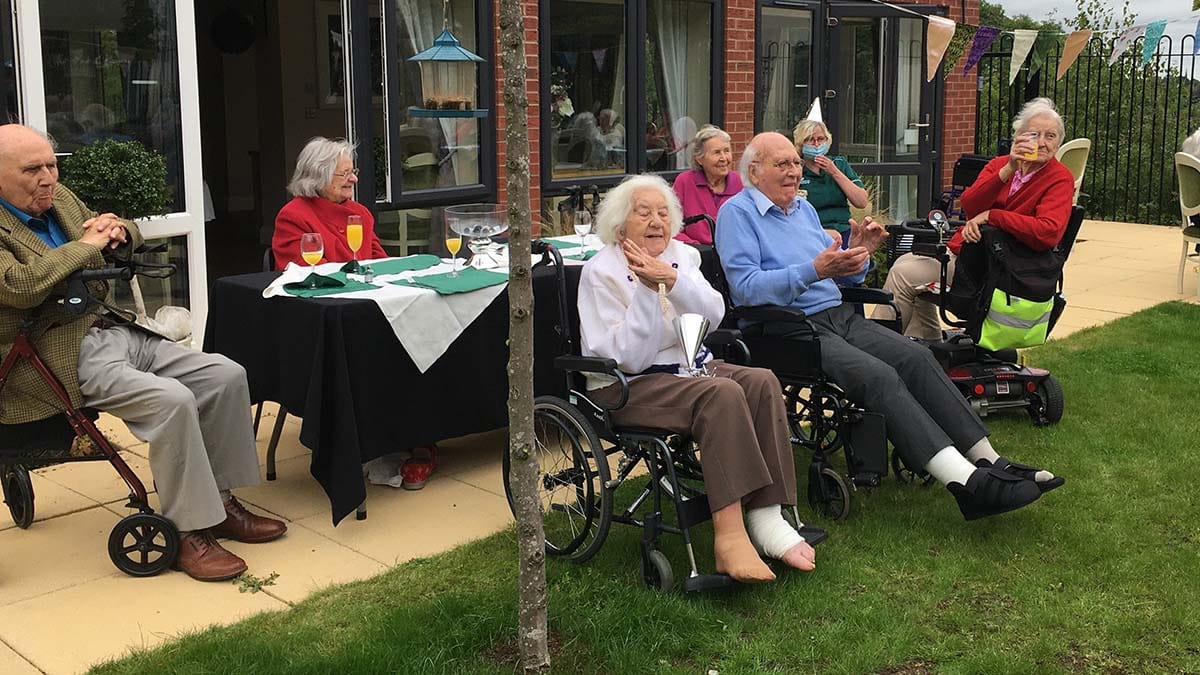 Residents enjoying the second anniversary party at The Spires care home