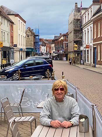 Michael Fabricant in the outdoor seating area at Corner Cafe on Bore Street