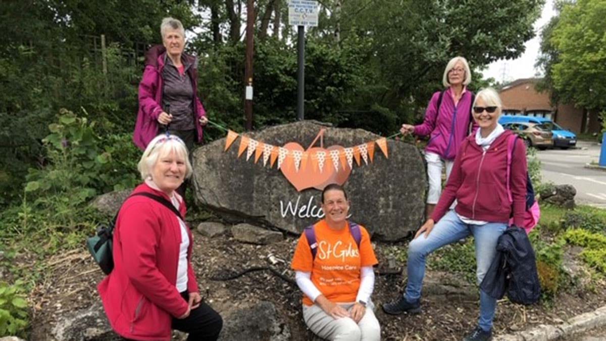 Sue Jones celebrating completing her sponsored walk with friends