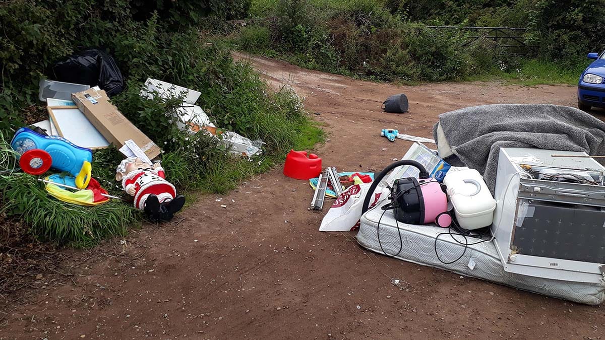 The waste left behind by fly-tippers on Wall Lane